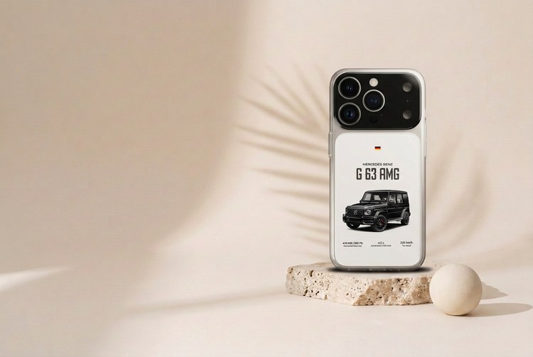 G63 AMG-style white phone case standing on a stone block in soft sunlight